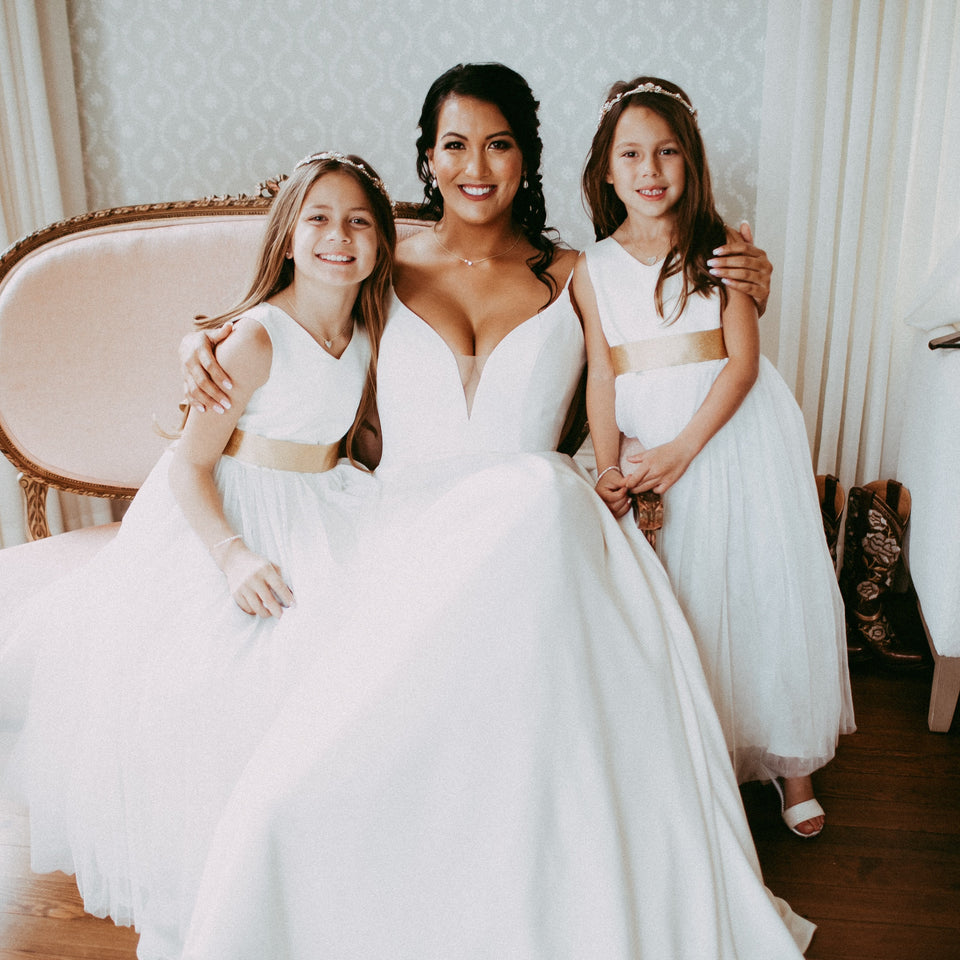 Bride with two girls in light ivory V-neck flower girl dresses, Grace by Ana Balahan