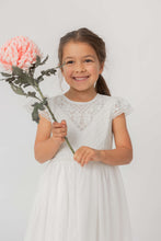 Load image into Gallery viewer, Happy girl with flower communion dress Sydney