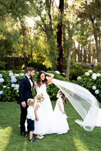 Load image into Gallery viewer, Bride and groom with page boy and flower girls in Grace flower girl dresses Ana Balahan
