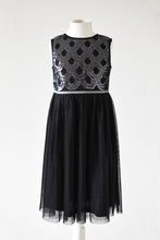 Load image into Gallery viewer, Anna Black seqiun dress with pleasted skirt front view Ana Blahan