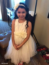 Load image into Gallery viewer, Flower girl wearing ivory Camellia set of wedding accessories floral sash and headpiece