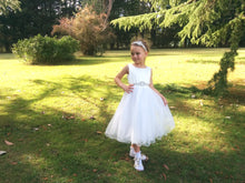 Load image into Gallery viewer, Girl in Adelina flower girl dress with rhinestone applique sash and headpiece set