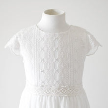 Load image into Gallery viewer, Lydia Light ivory dress with pleated skirt and cap sleeves front close view Ana Balahan