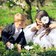 Load image into Gallery viewer, Boy in stylish gentlemen suit picking flowers with a flower girl