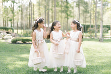 Load image into Gallery viewer, Three girls in Adelina dress laughing
