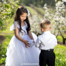 Load image into Gallery viewer, Cute girl in white jasmine blossom tutu dress and handsome boy in smart suit playing with a flower
