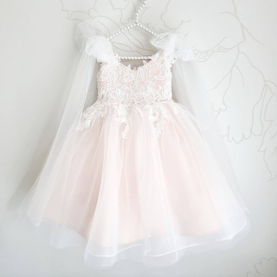Anastasia dress, gentle pink and light ivory color dress made from satin and tulle with lace decorated top and tulle bows on shoulders