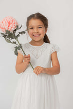Load image into Gallery viewer, Happy girl with flower communion dress Sydney
