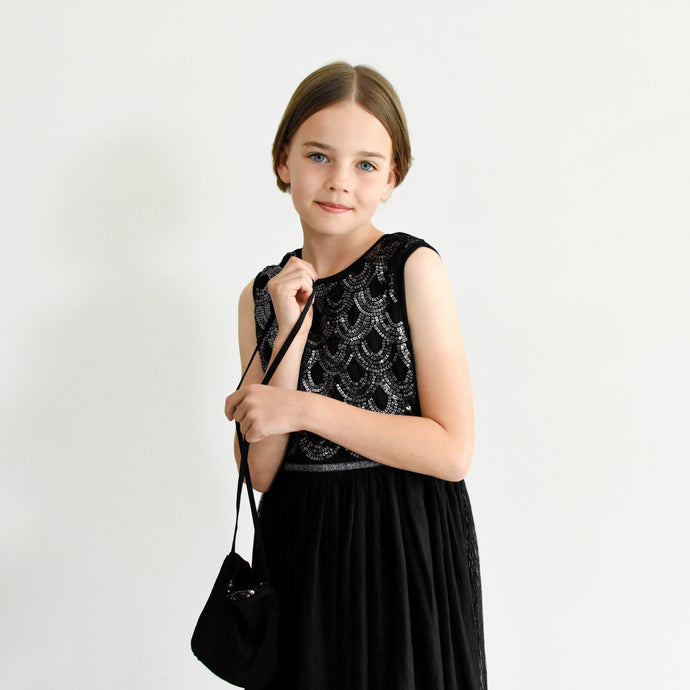 Anna black sequined party dress with pleated skirt front view Ana Balahan