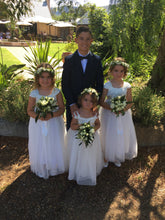 Load image into Gallery viewer, Annabelle dress Ana Balahan tree little girls in long white flower girl outfits with flowers 
