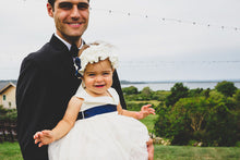 Load image into Gallery viewer, Dad holding little cute girl in Adelina dress
