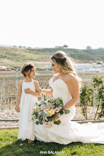 Load image into Gallery viewer, Bride and flower girl with wedding bouquet at a winary wedding
