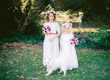 Load image into Gallery viewer, Two little girls in their long romantic wedding outfits with charming lace tops and with flower wreaths by Ana Balahan Australia
