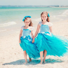 Load image into Gallery viewer, Two girls in Breeze dress on a beach
