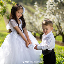 Load image into Gallery viewer, Girk in white tutu dress and boy in white shirt and black trousers
