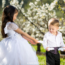 Load image into Gallery viewer, Cute girl in white jasmine blossom tutu dress and handsome boy in smart suit watching a flower
