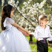 Load image into Gallery viewer, Boy and girl in smart occasional cloth are watching a flower
