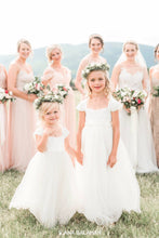 Load image into Gallery viewer, Two girls in Annabelle dress in front of a bride with bridesmaids
